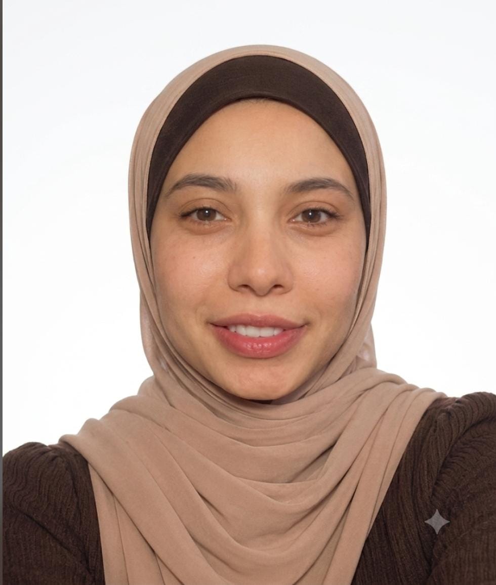 Coach. Asiya Darwish